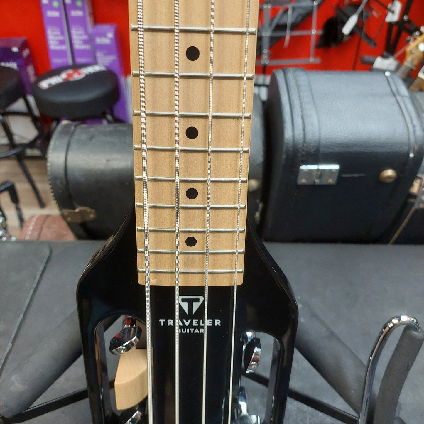 2020's Traveler Guitar ULB1716 4-String Bass Guitar - Black w/ Gig Bag